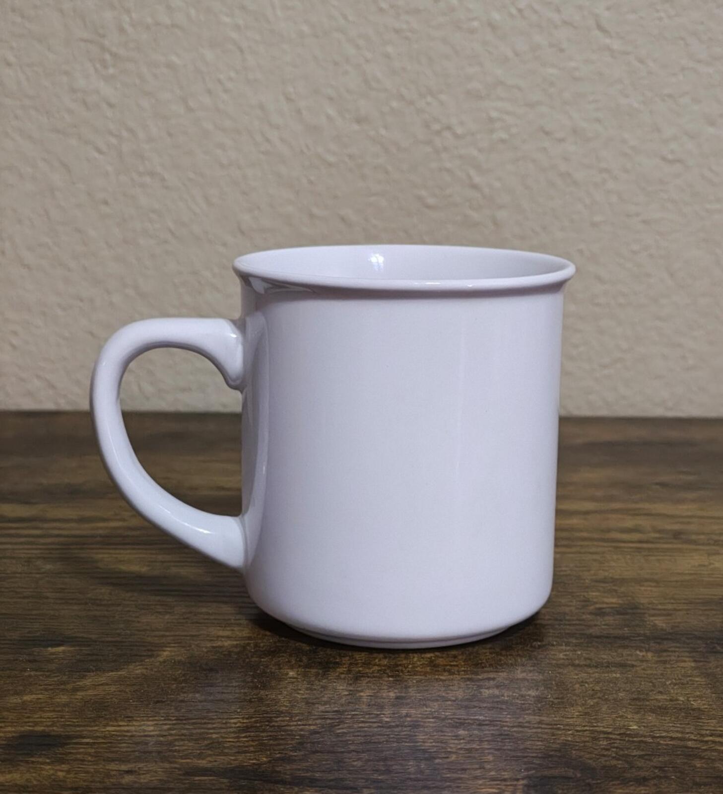 White ceramic cat mug with handle, plain side view