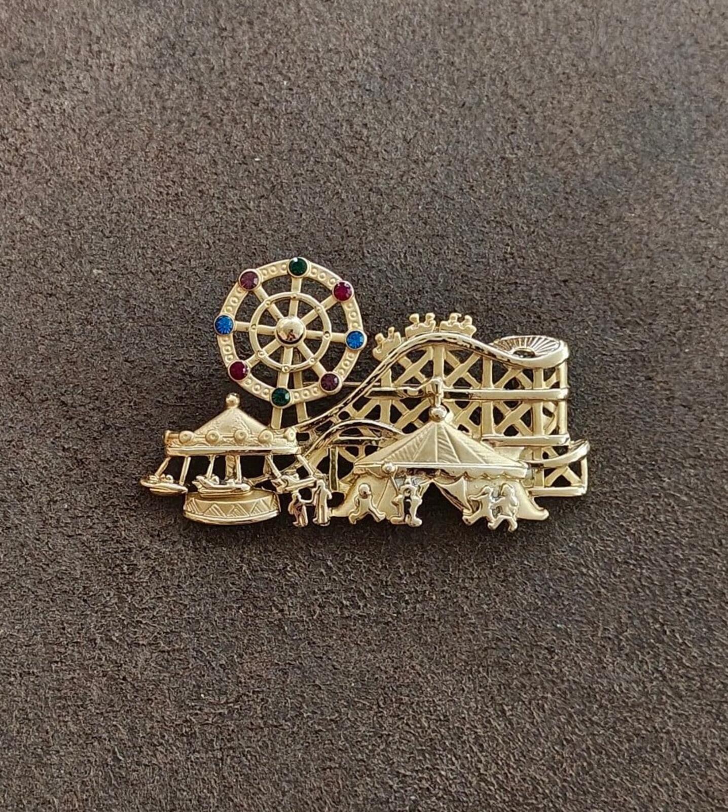 1980s Signed AJC Carnival Themed Gold Tone Brooch.