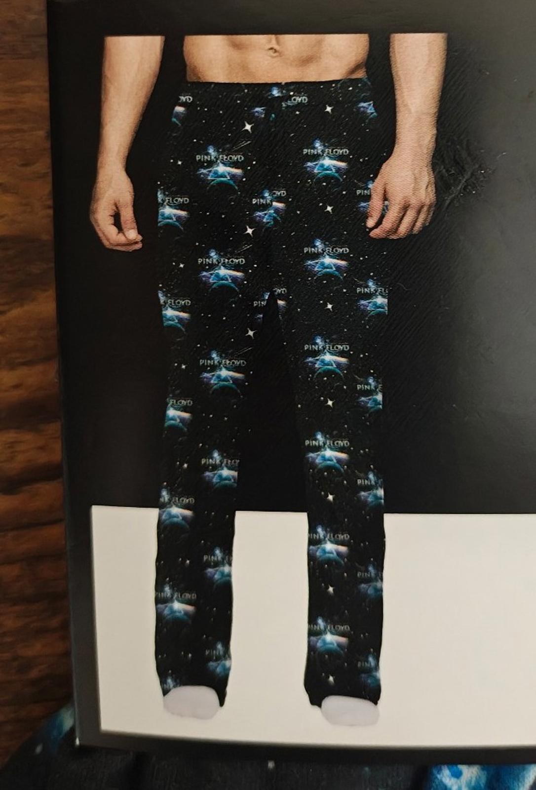 Mens black galaxy-print sleep pants with drawstring waist, cropped front view