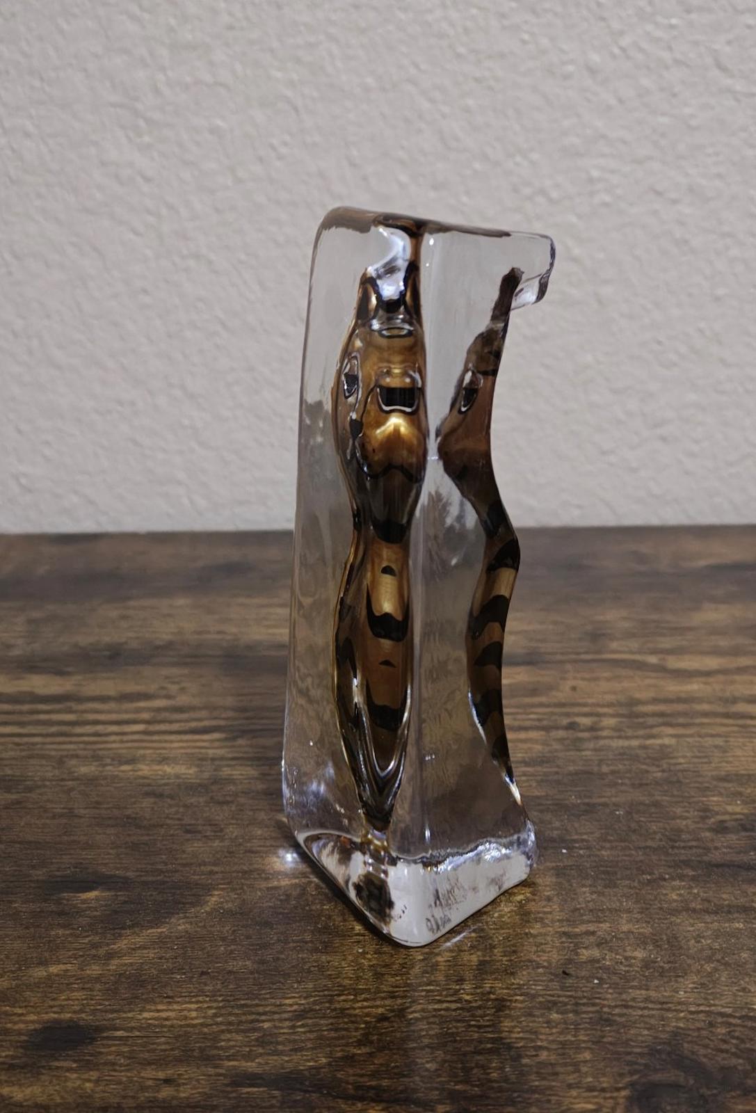Clear cat paperweight figurine side view, reflective block with gold tabby stripes