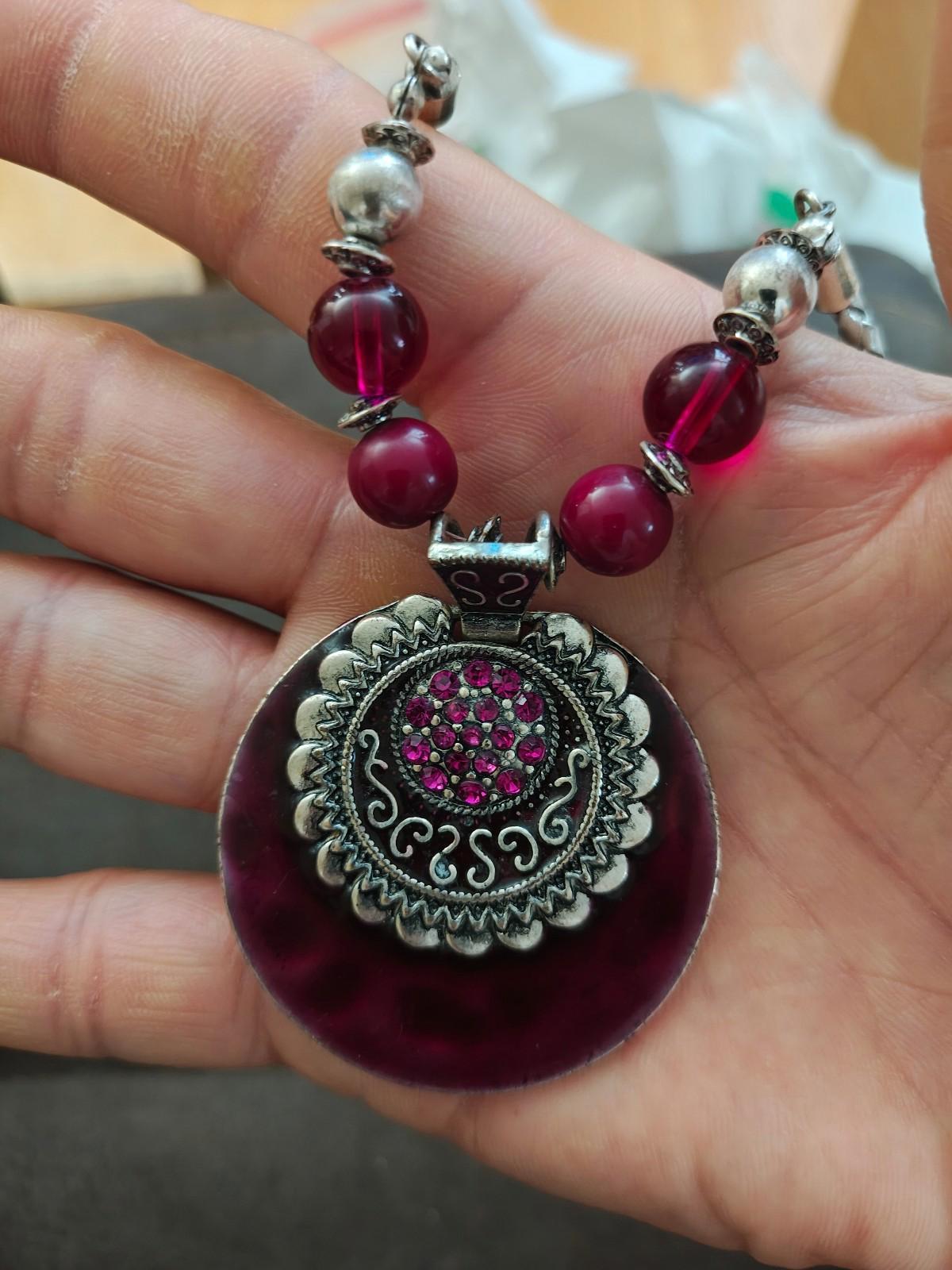 Silver Tone Braided Plastic Chain With Round Burgundy Pendant and Beaded Accents