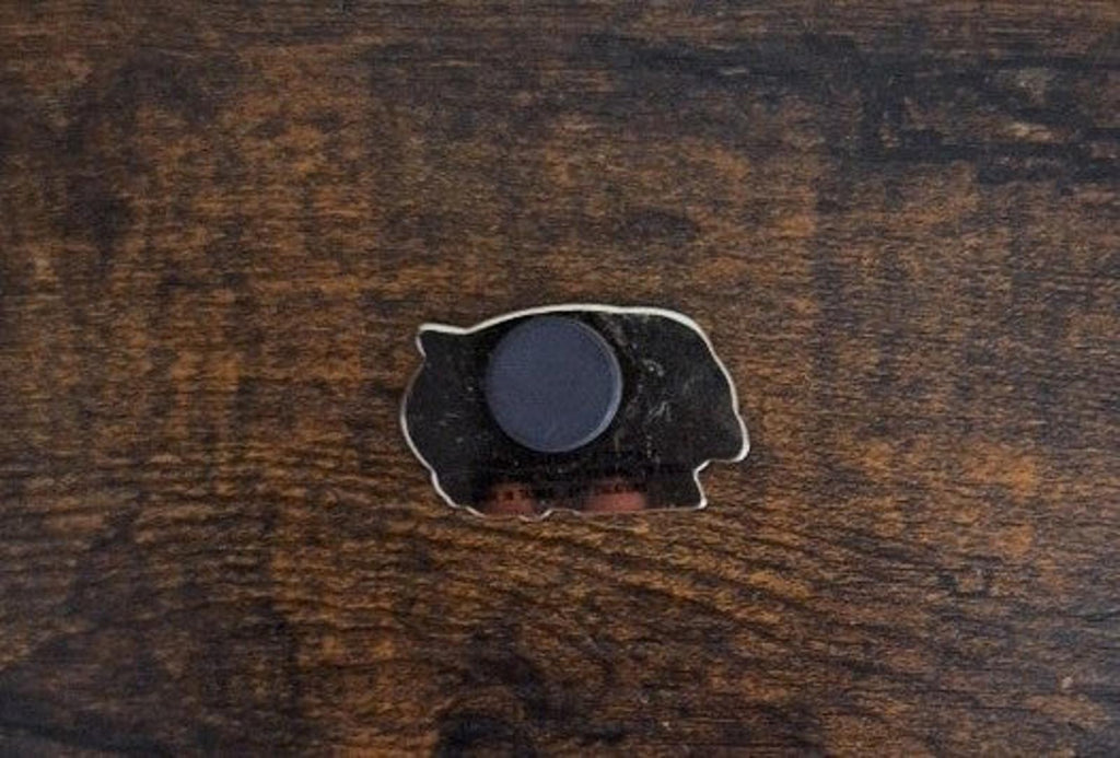 Enamel magnet back with round gray magnet center and dark backing