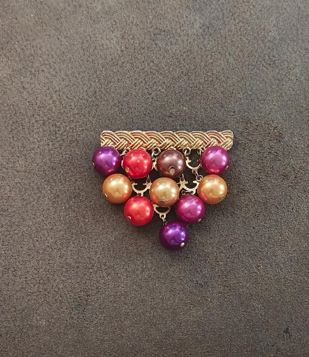 Gold braided chandelier brooch with purple and red bead clusters and gold beads