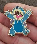 Blue Stitch enamel character pin with colorful face and gold-tone border