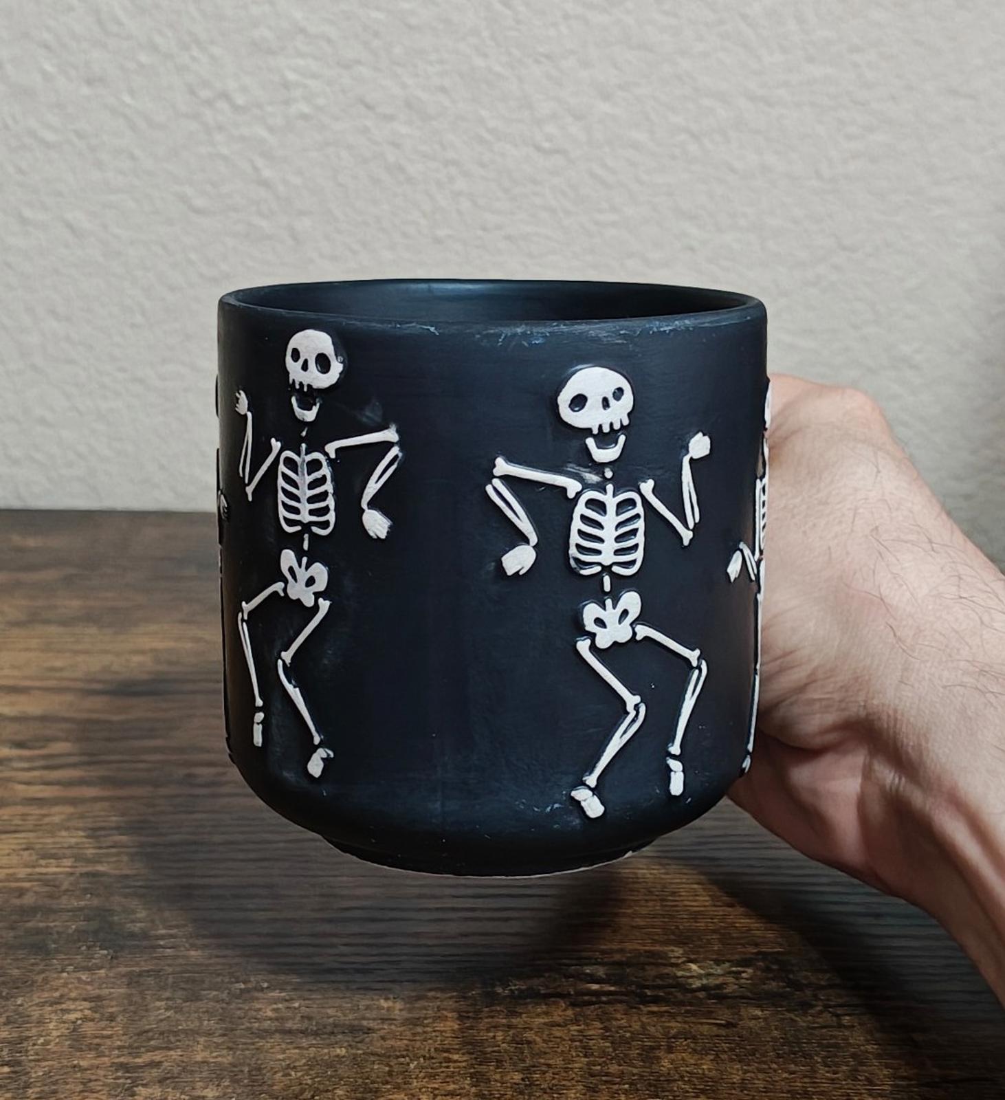 Dancing Skeletons Black Earthenware 13 oz 3D Embossed Black Mug.