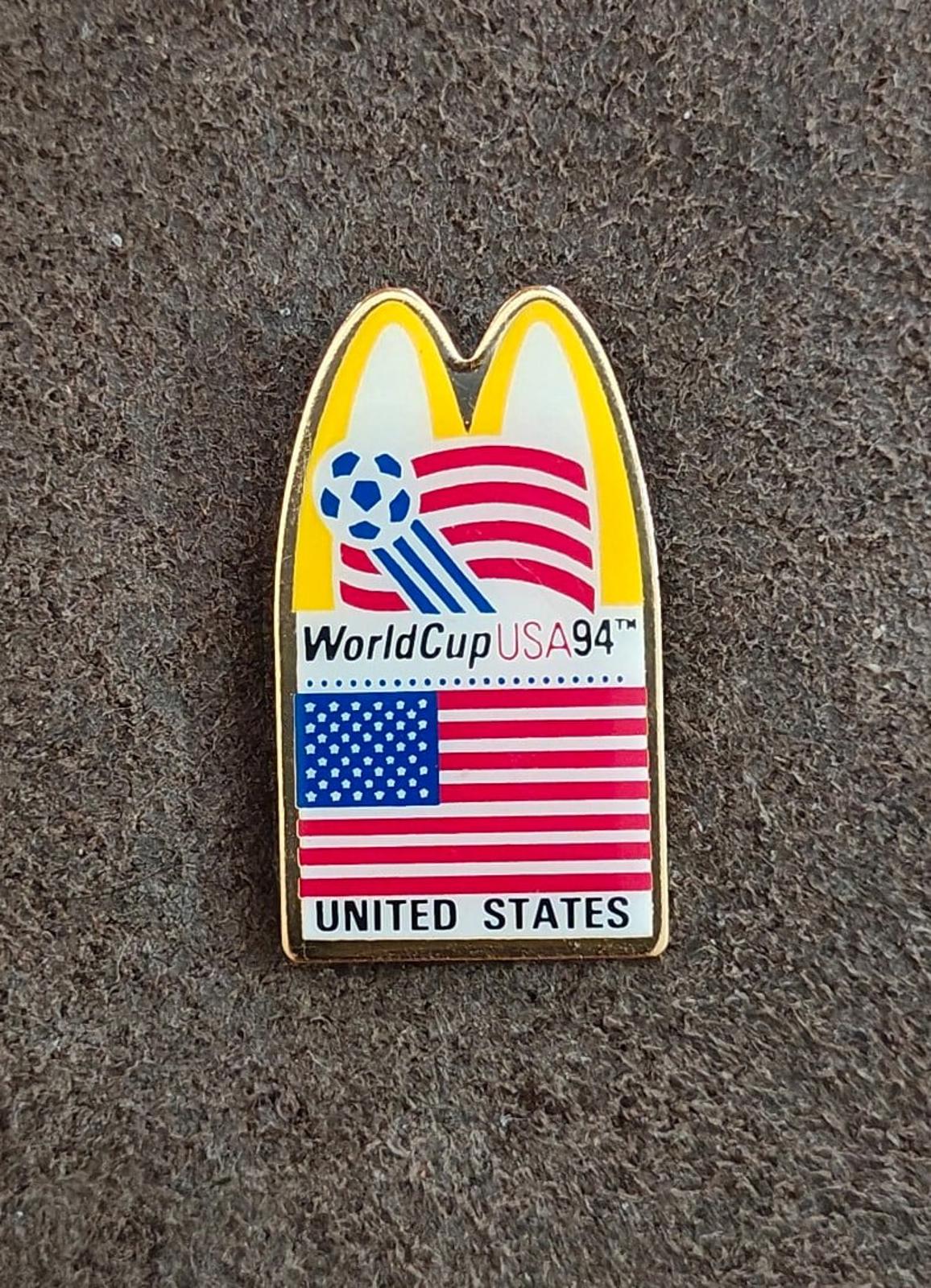 Gold-tone WorldCup USA '94 pin with McDonald's arch and UNITED STATES label