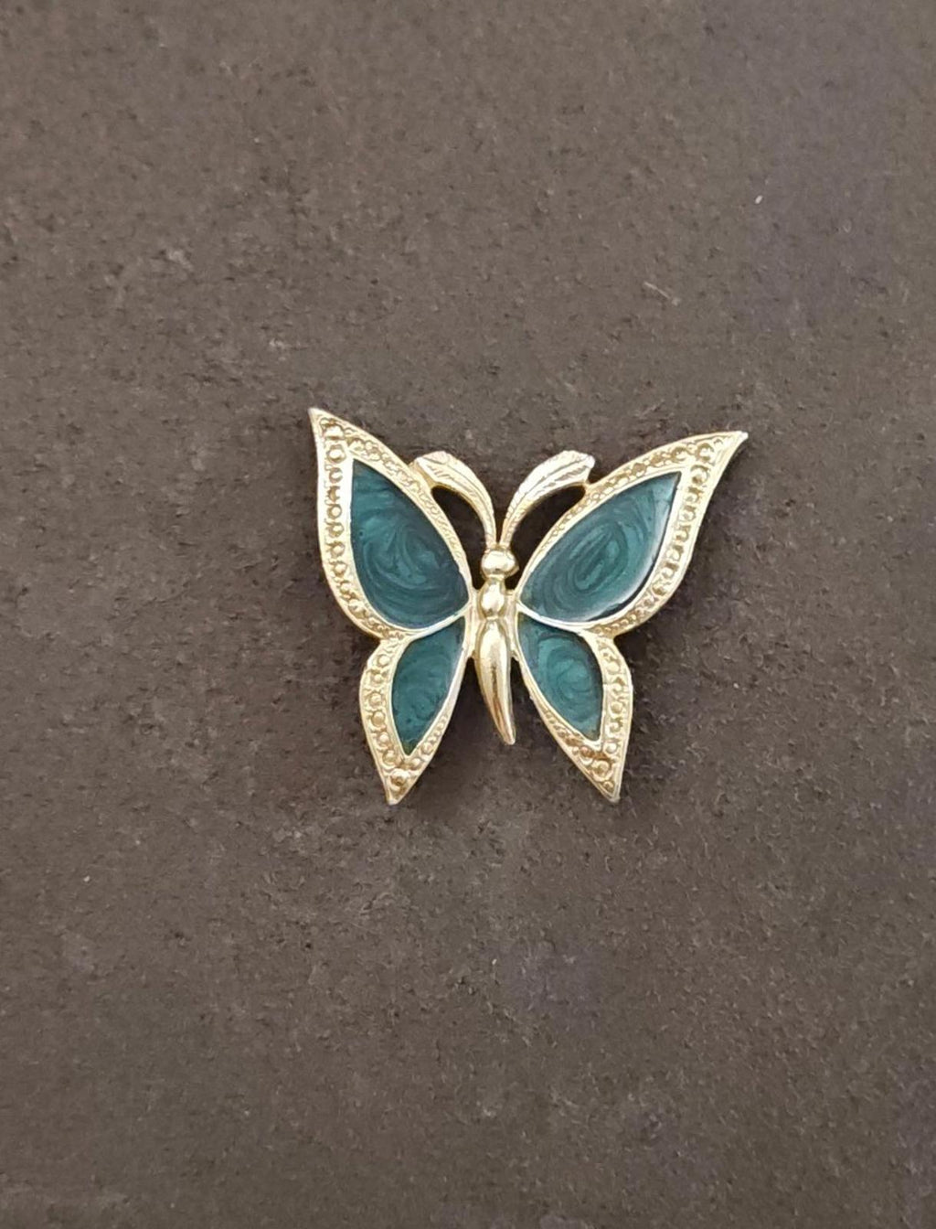 1980s Gold Tone With Green Enamel Textured Butterfly Brooch