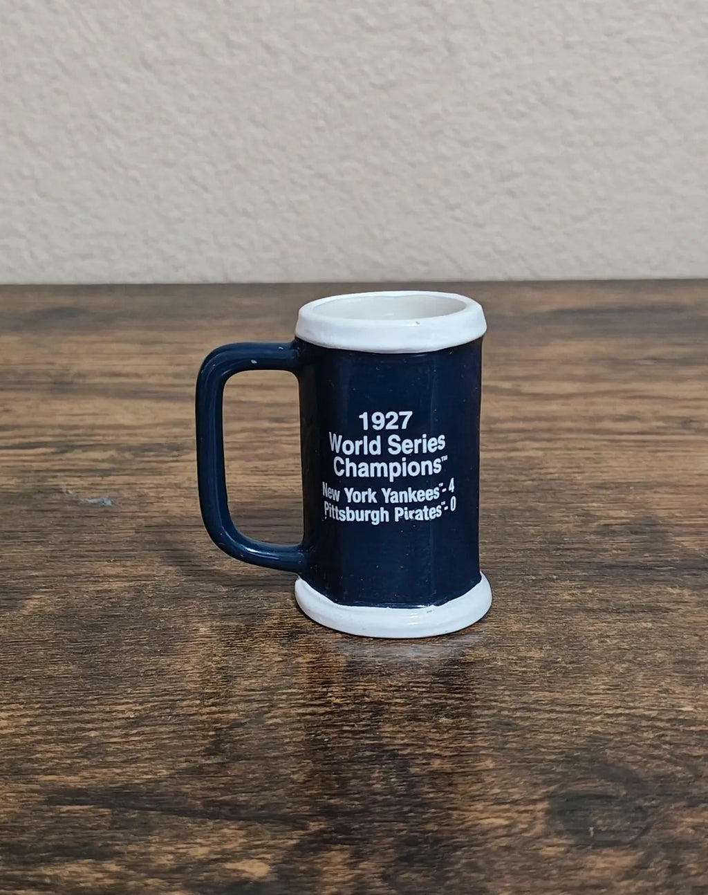 Blue decorative miniature mug with 1927 World Series Champions text on front