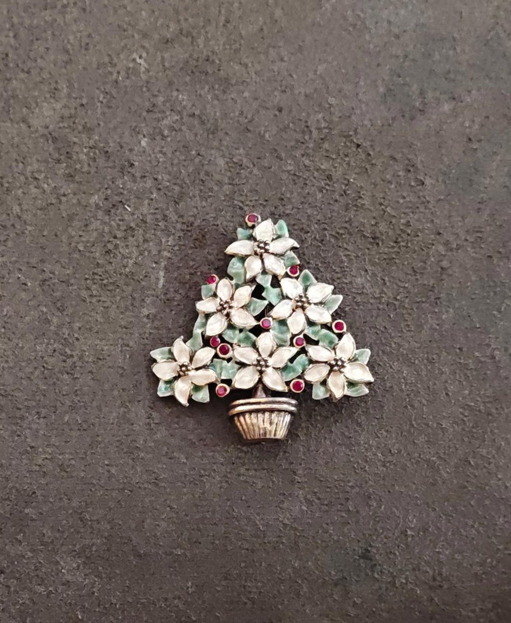 Christmas tree brooch with gold basket, white flower clusters, green leaves, red berries