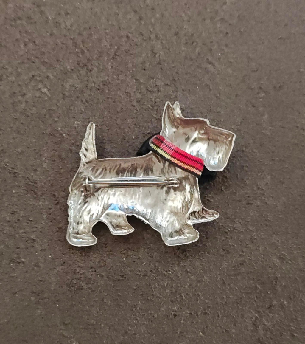 Silver-tone terrier brooch with red striped collar and straight pin bar