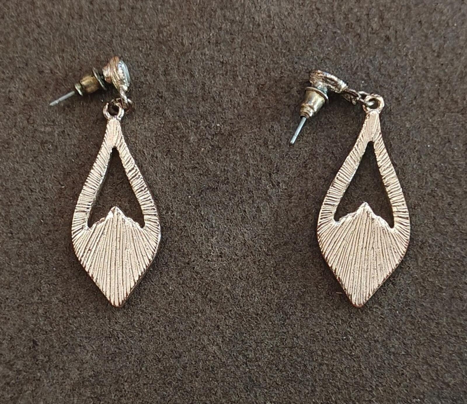 Textured gold-tone teardrop dangle earrings with post backs and decorative slits