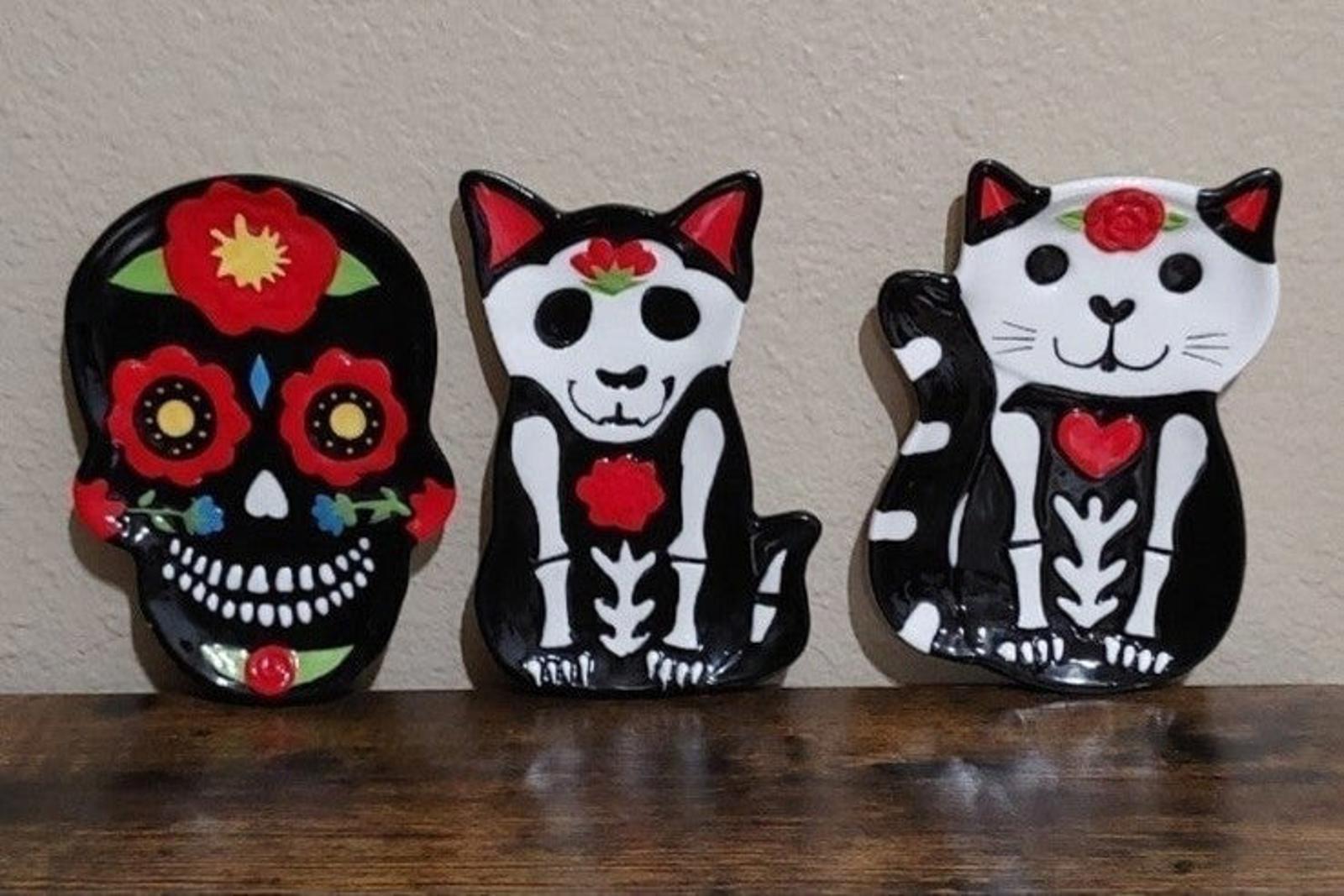 3-piece trinket plate set showing three black cat sugar skull designs with red hearts