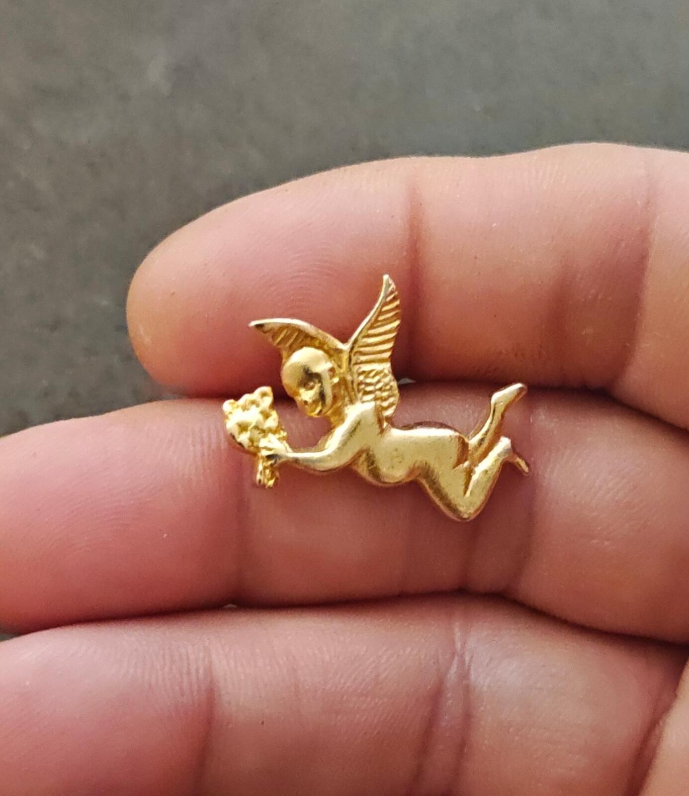 1990s Gold Tone Flying Angel Holding Flowers Brooch