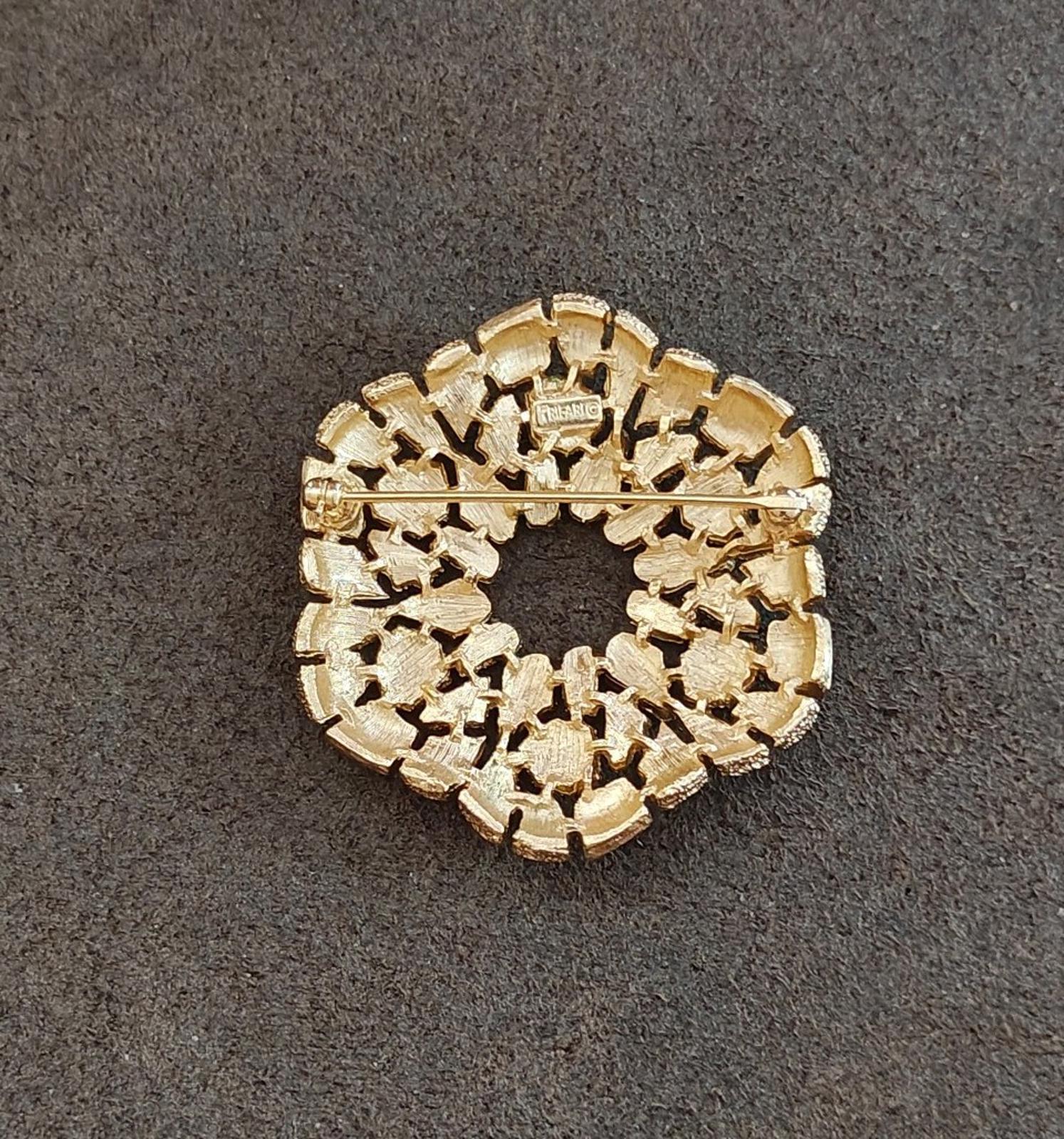 Gold-tone textured back of wreath brooch with hinge and clasp hardware
