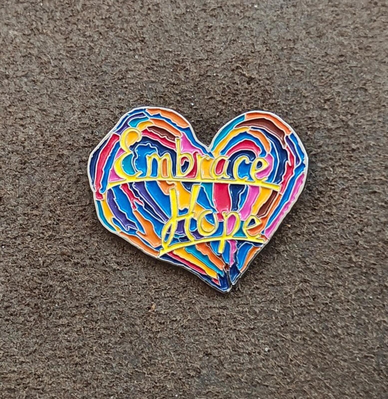 1990s Penzeys Spices Embrace Hope Rainbow Heart Enamel Pin