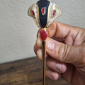 Monet gold-tone enamel flower pin brooch with dark blue center and red teardrop petals