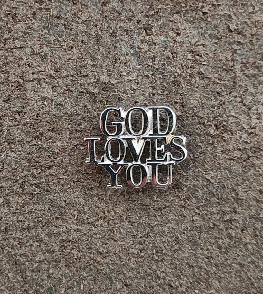 Sterling silver “GOD LOVES YOU” pin with raised letter design