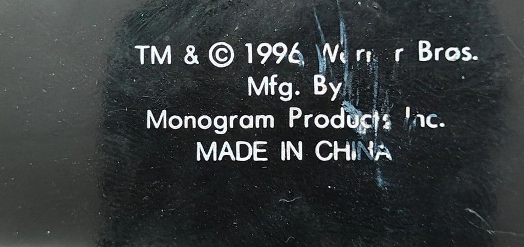 Copyright text on keychain back: Warner Bros., Monogram Products, made in China.