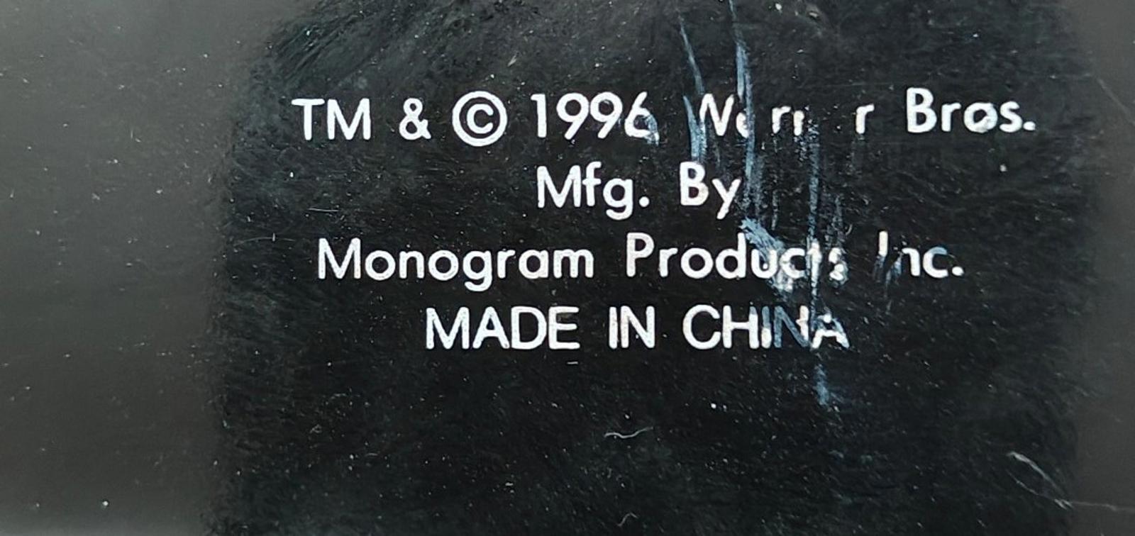Copyright text on keychain back: Warner Bros., Monogram Products, made in China.