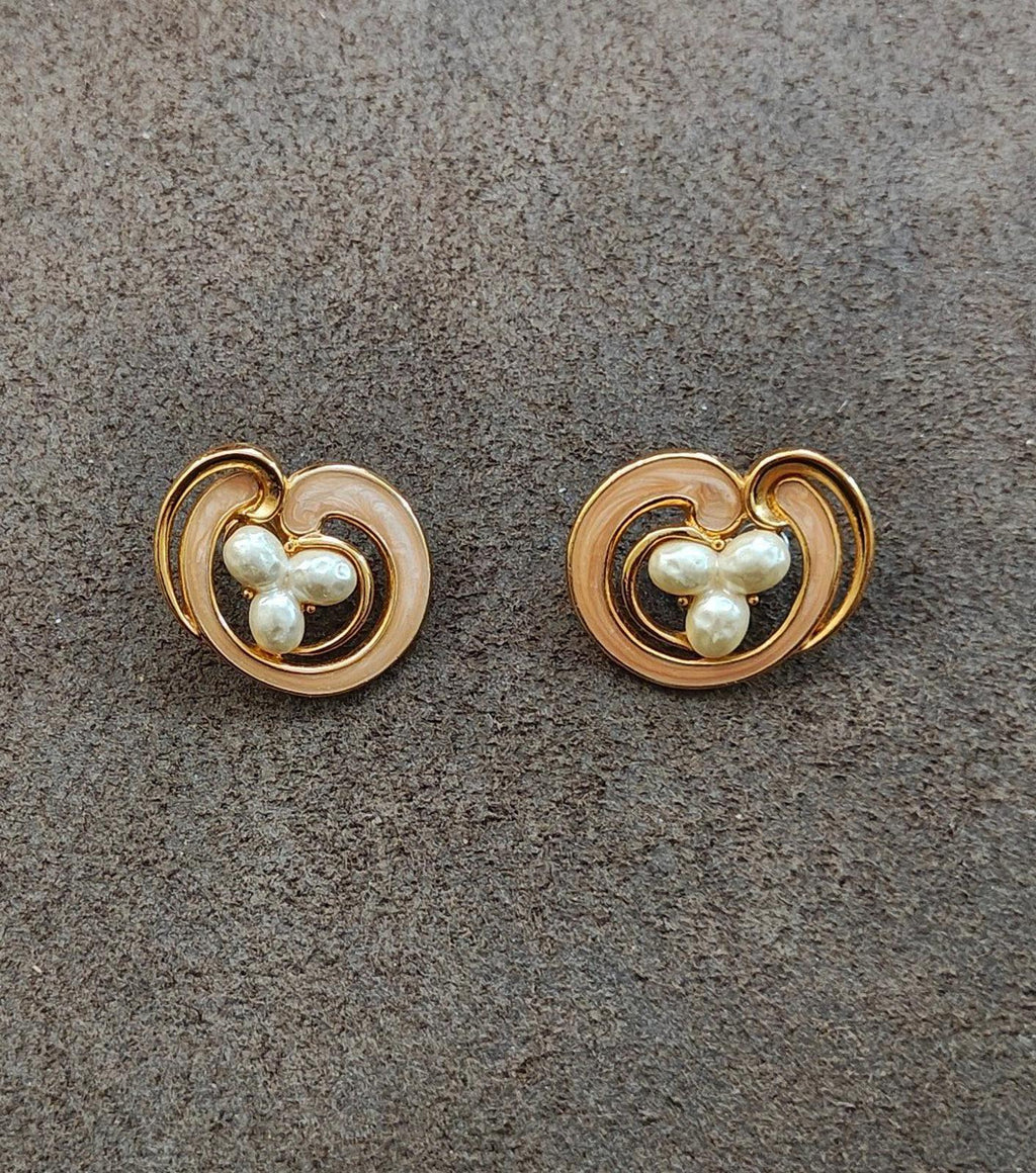 Pair of heart faux pearl clip-on earrings with cream enamel centers and gold tone rims