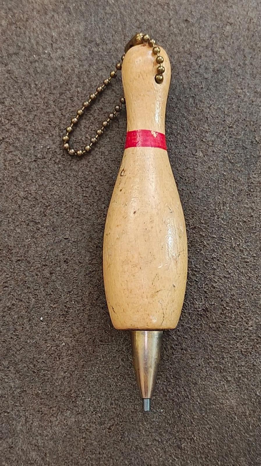 Beige wooden bowling pin mechanical pencil keychain with red band and bead handle chain