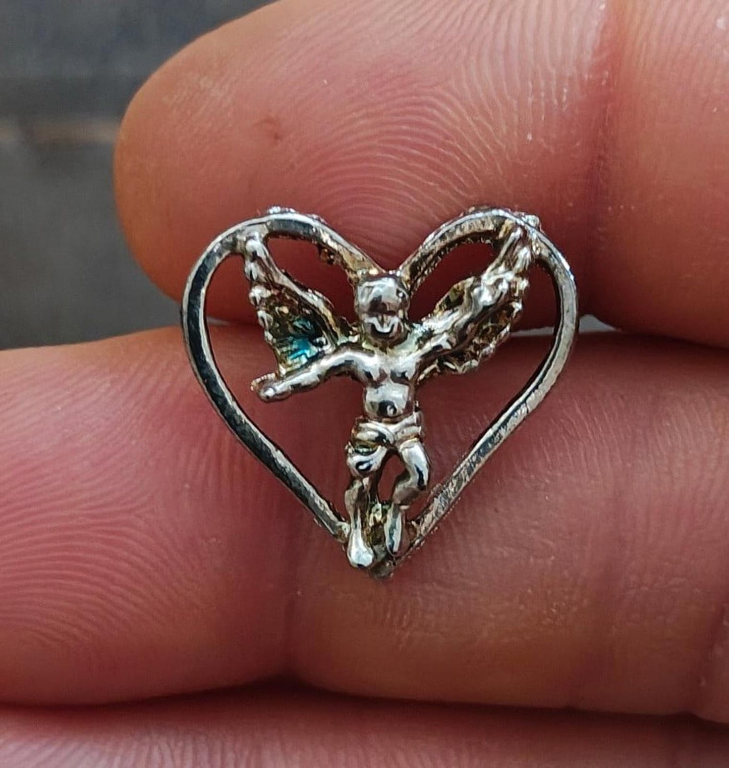 1980's Silver Tone Angel Inside A Heart Pin