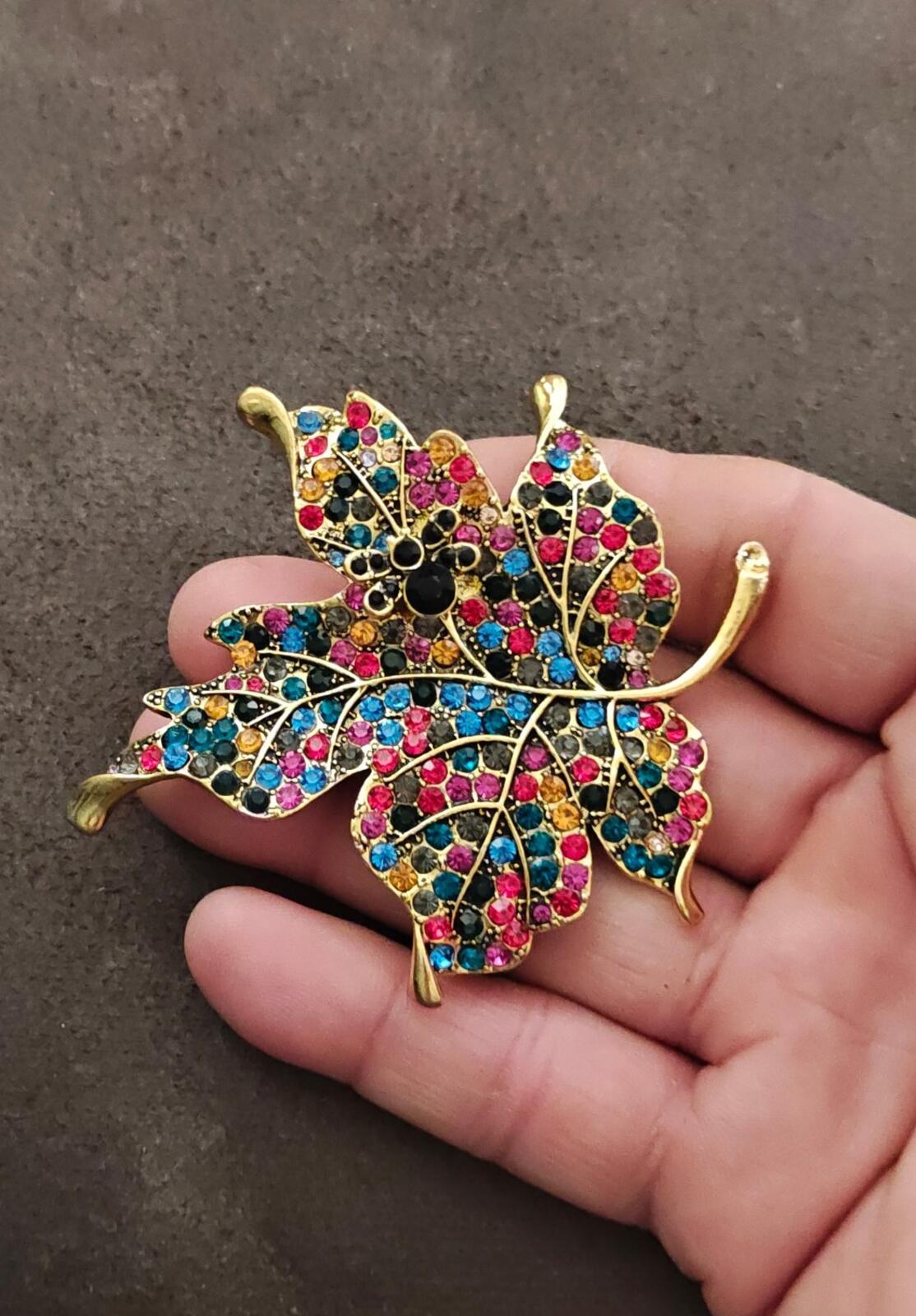 1980s Gold Tone Maple Leaf With Multi Colored Rhinestones Brooch