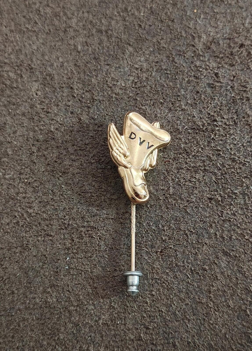 Gold tone DVV winged emblem lapel pin, centered front with straight post