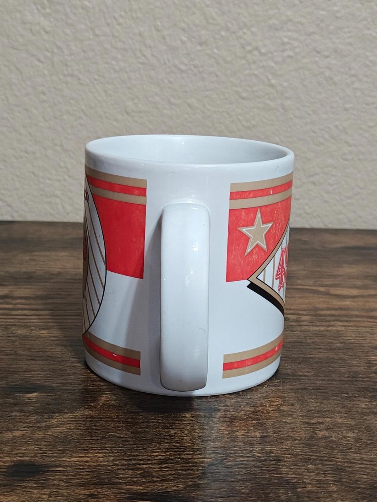 San Francisco 49ers mug side view with red stripes and star graphic.
