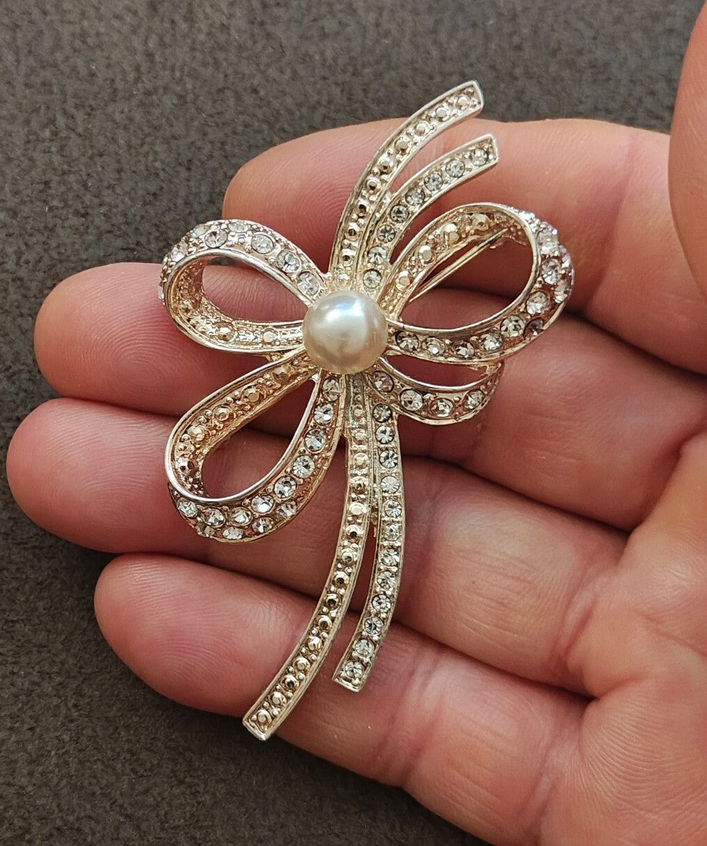1980s Silver Tone Ribbon Bow With Clear Rhinestones & Large Faux Pearl Brooch