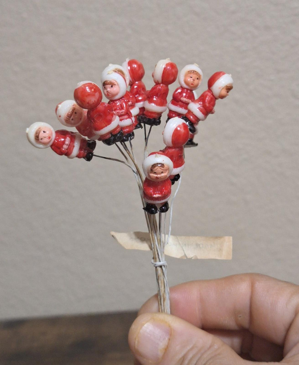 1950s/60s Set Of 12 Hand Painted Hard Plastic Mini Eskimos on a Wire