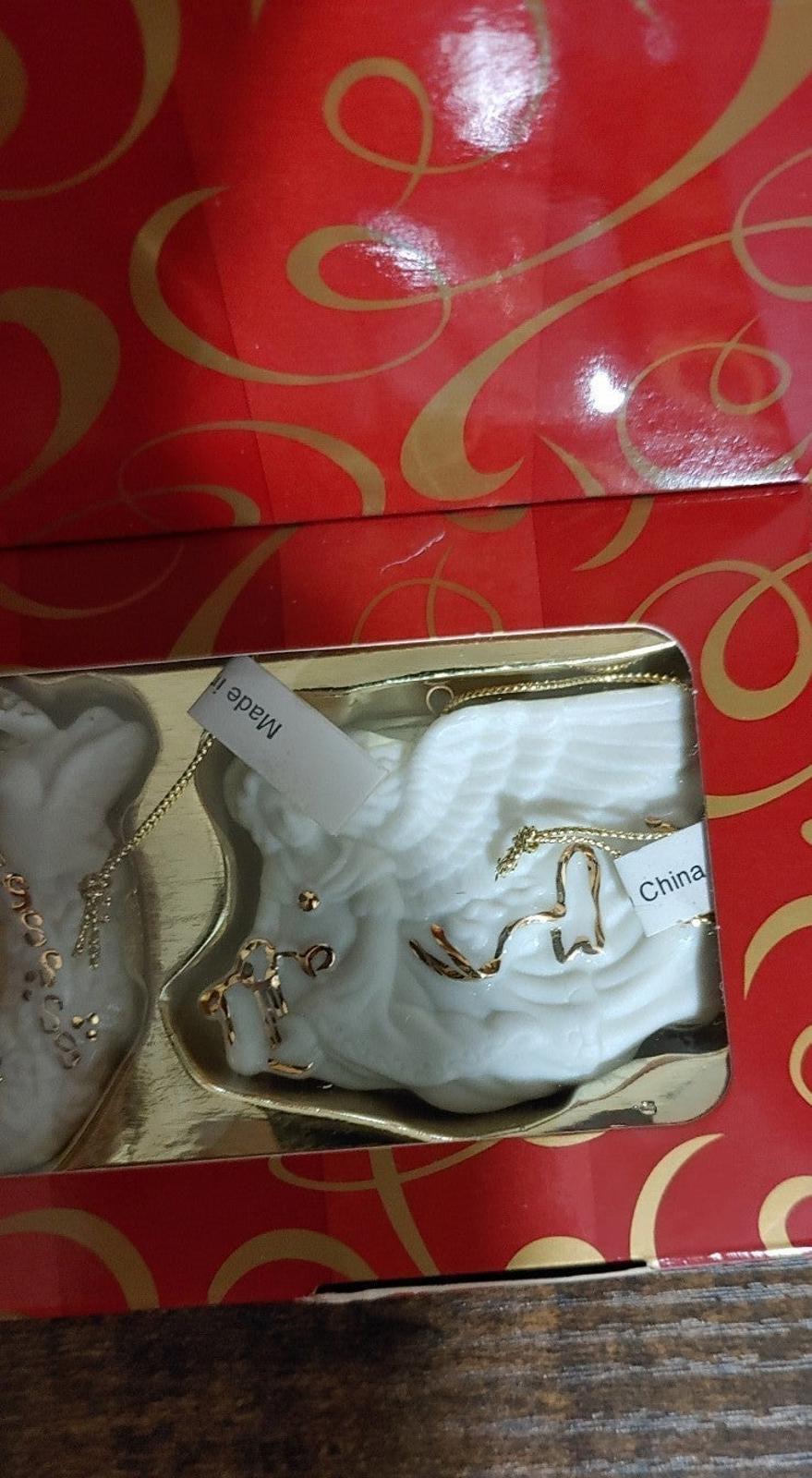Bisque porcelain ornament hanging horse design with gold trim in red gift box