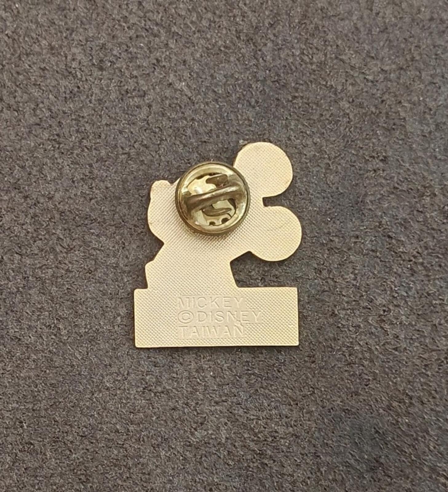 Gold-tone pin back with butterfly clasp and stamped Mickey, Disney, Taiwan