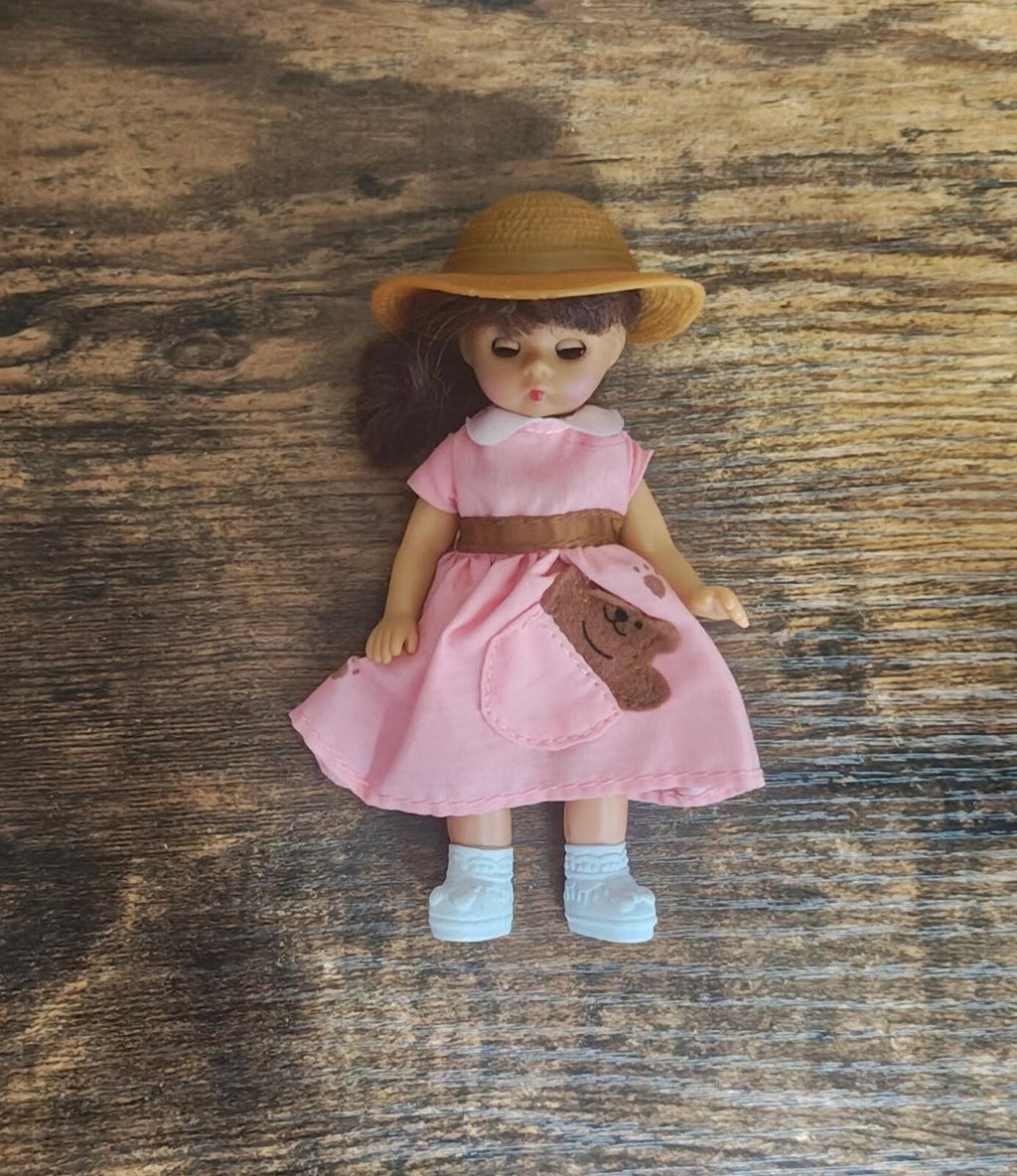 Pink doll full body, straw hat, pink dress with bear applique, and white shoes