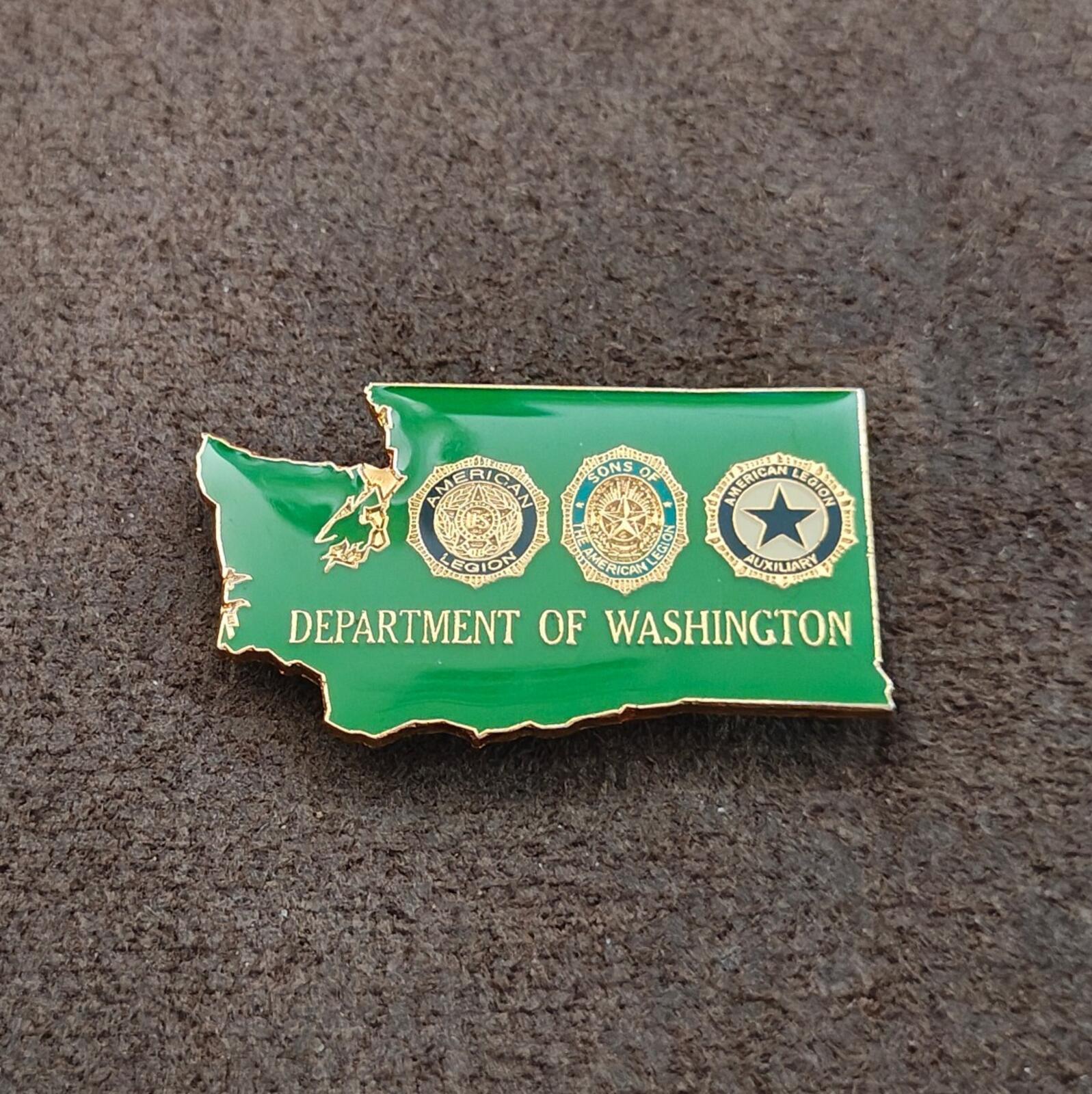 Green rectangular pin with Washington state outline and gold-tone insignia