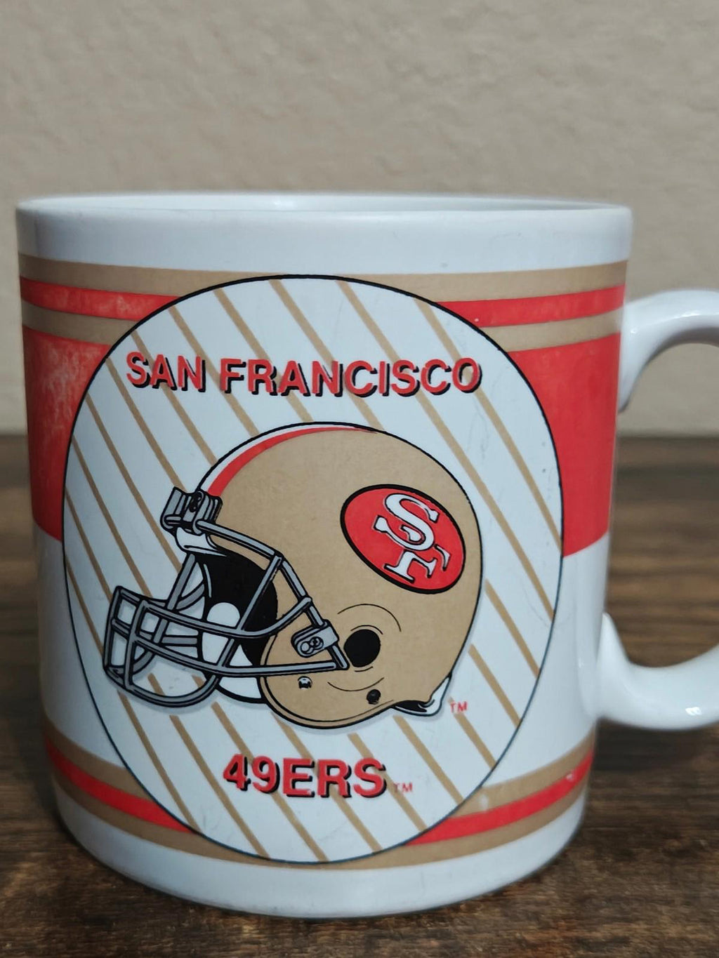San Francisco 49ers helmet logo mug close view with red “49ERS” text.