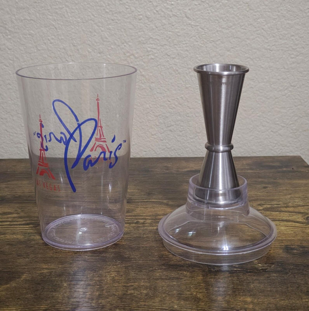 Clear plastic cocktail shaker cup and silver metal spout base pieces