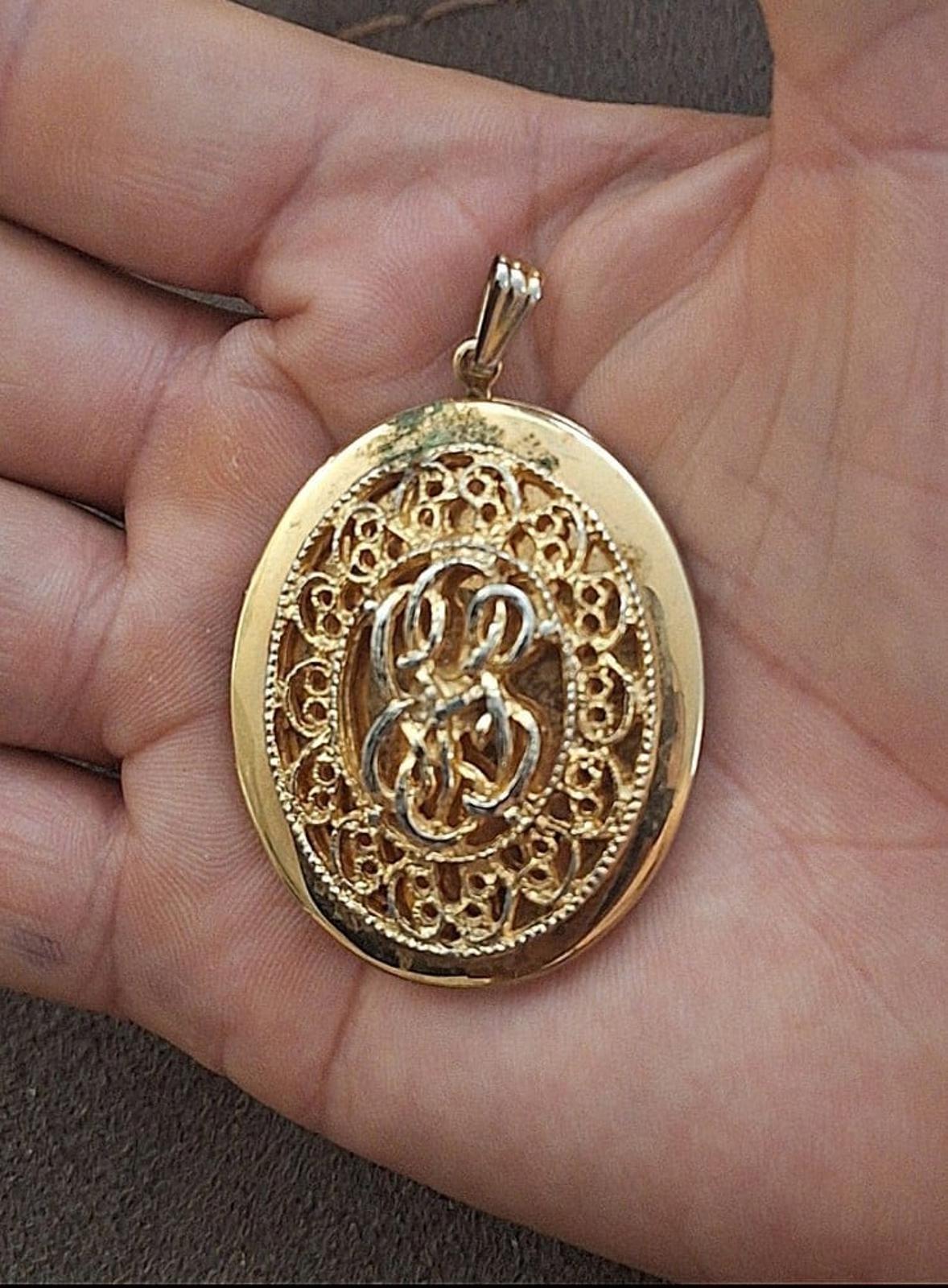 1980s Large Gold Tone Filigree Oval Locket Pendant
