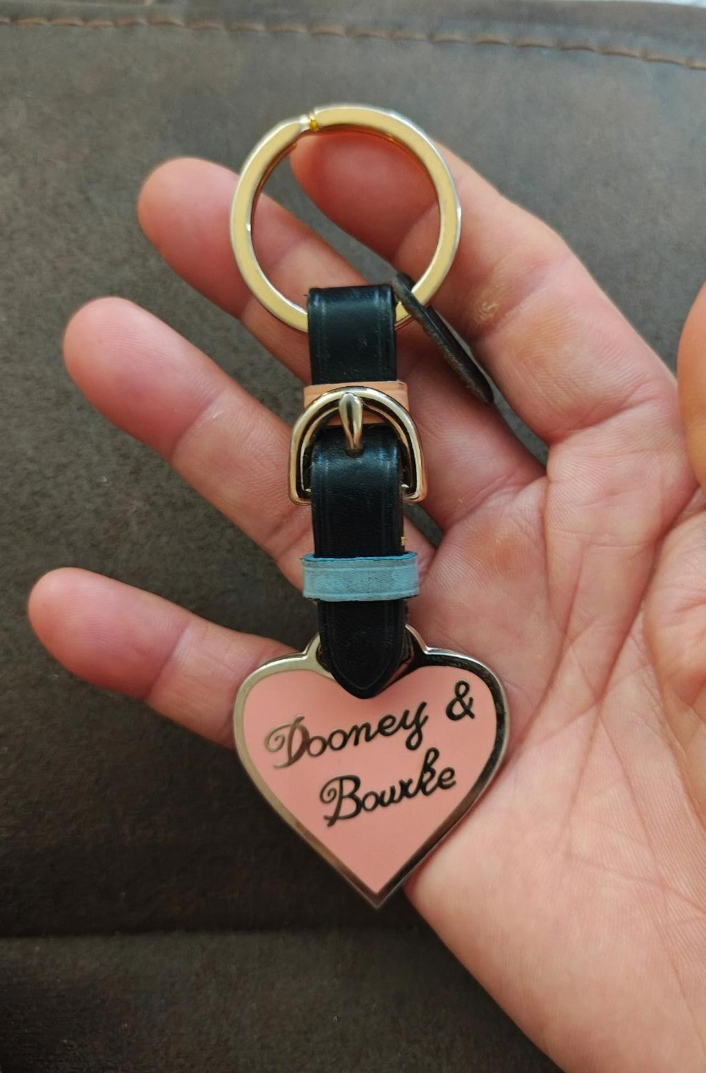 Dooney & Bourke heart keychain with black strap, light blue accent, gold key ring