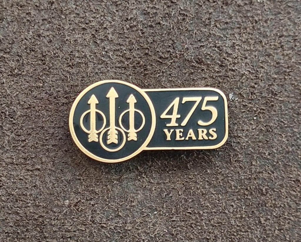 Beretta 475 Years enamel lapel pin, gold-tone black enamel front with three emblem shapes