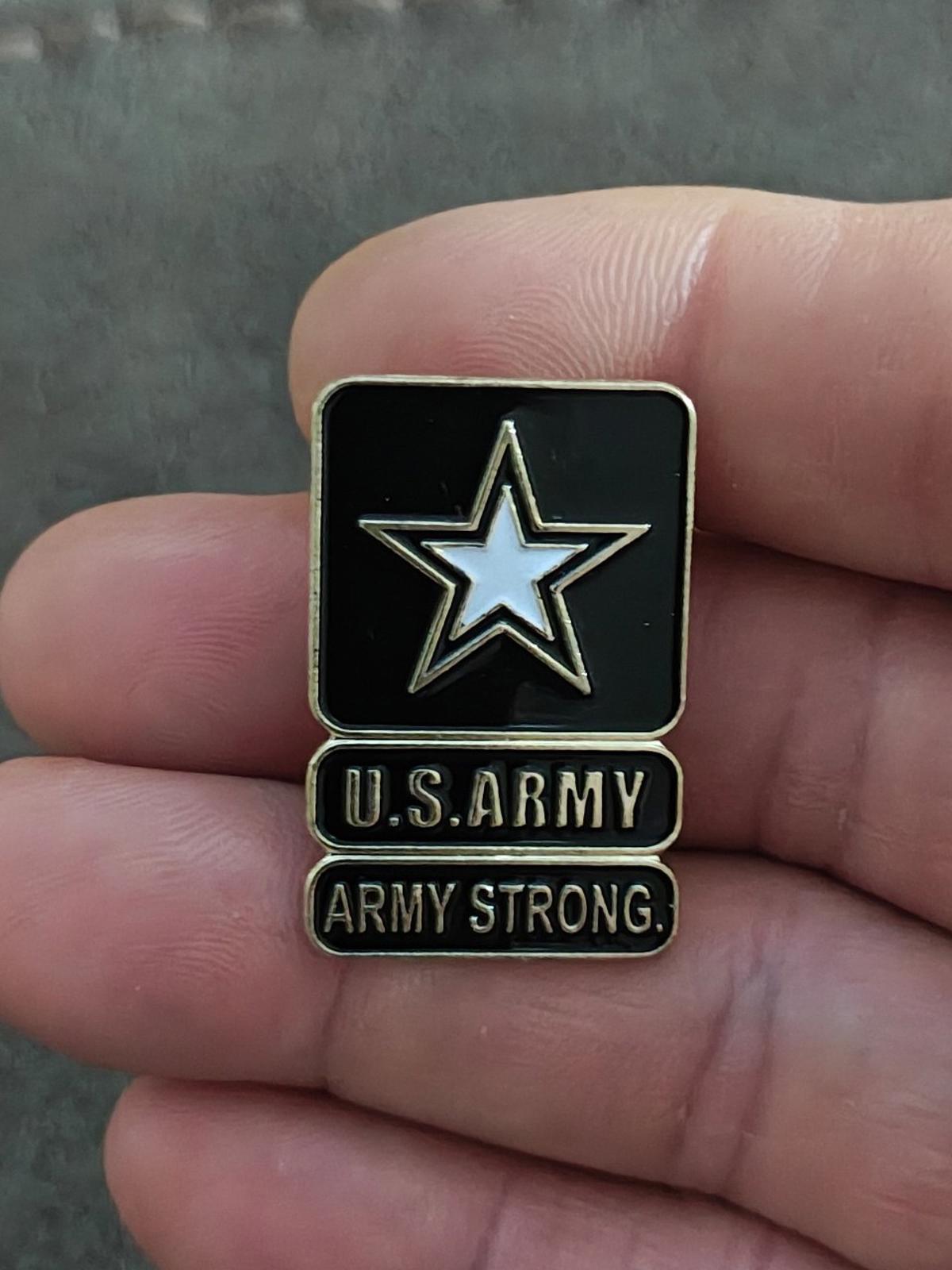 Black enamel U.S. Army star lapel pin with U.S. ARMY and ARMY STRONG