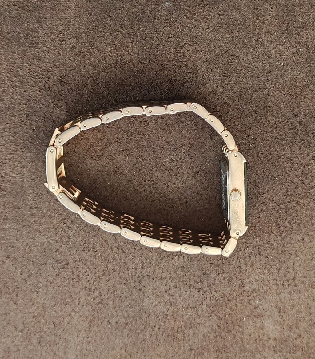 Gold-tone geometric link bracelet band with hinged end and engraved side pattern