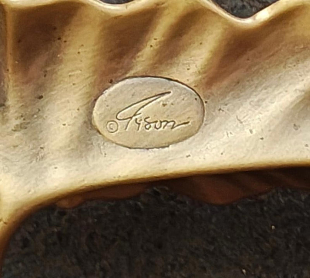 Signed gold-tone leaf brooch pin back marked "TYSON" in oval stamp.