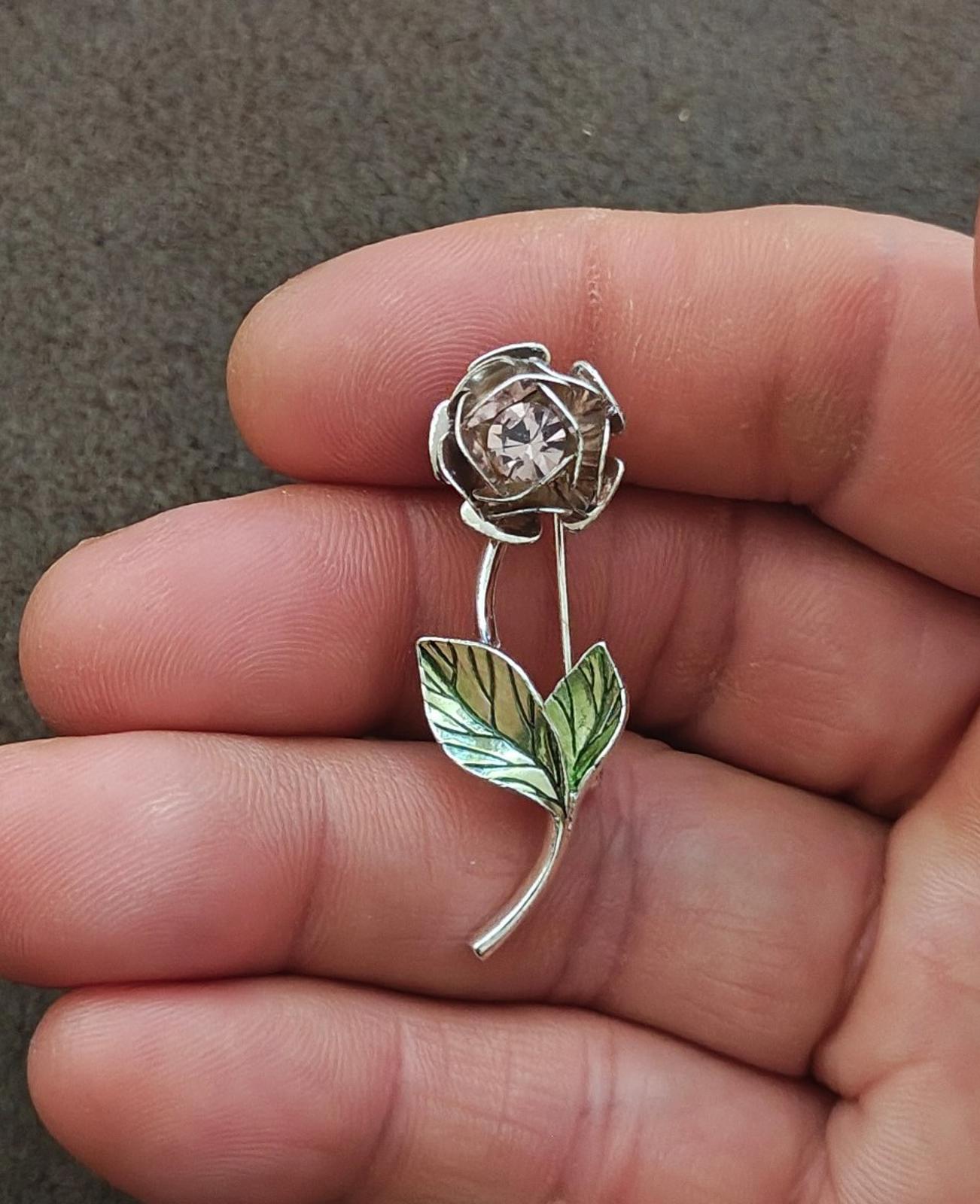 1990s Signed Avon Silver Tone With Green Enamel and Rhinestone Flower Brooch