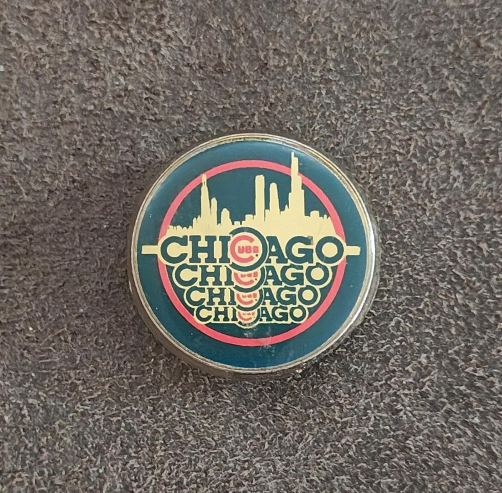 Chicago Cubs MLB round enamel pin with teal “Chicago” skyline, red ring, gold edge