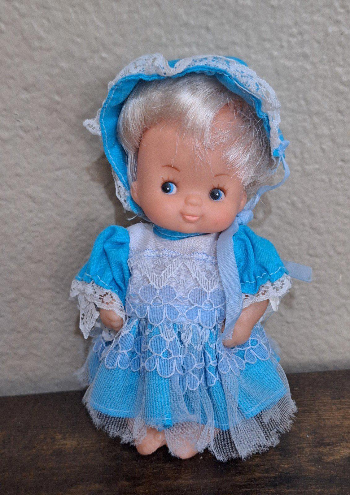 1970's Miniature Baby Doll With Blue Dress and Blue Eyes