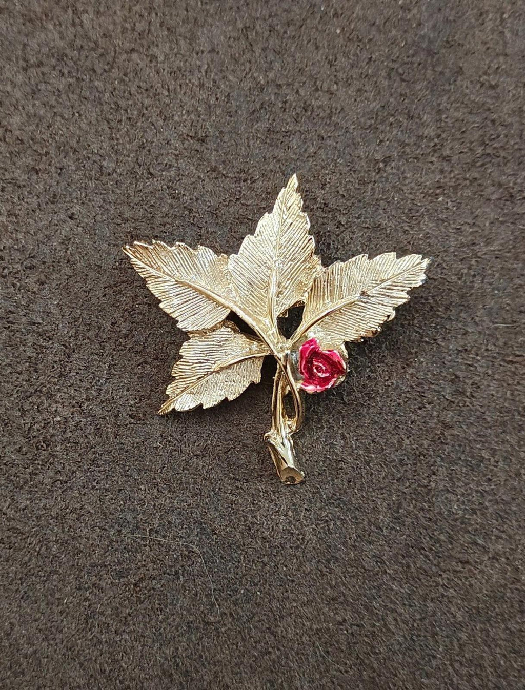 Gold-tone leaf cross pin brooch with red rose and Mary medallion, small view