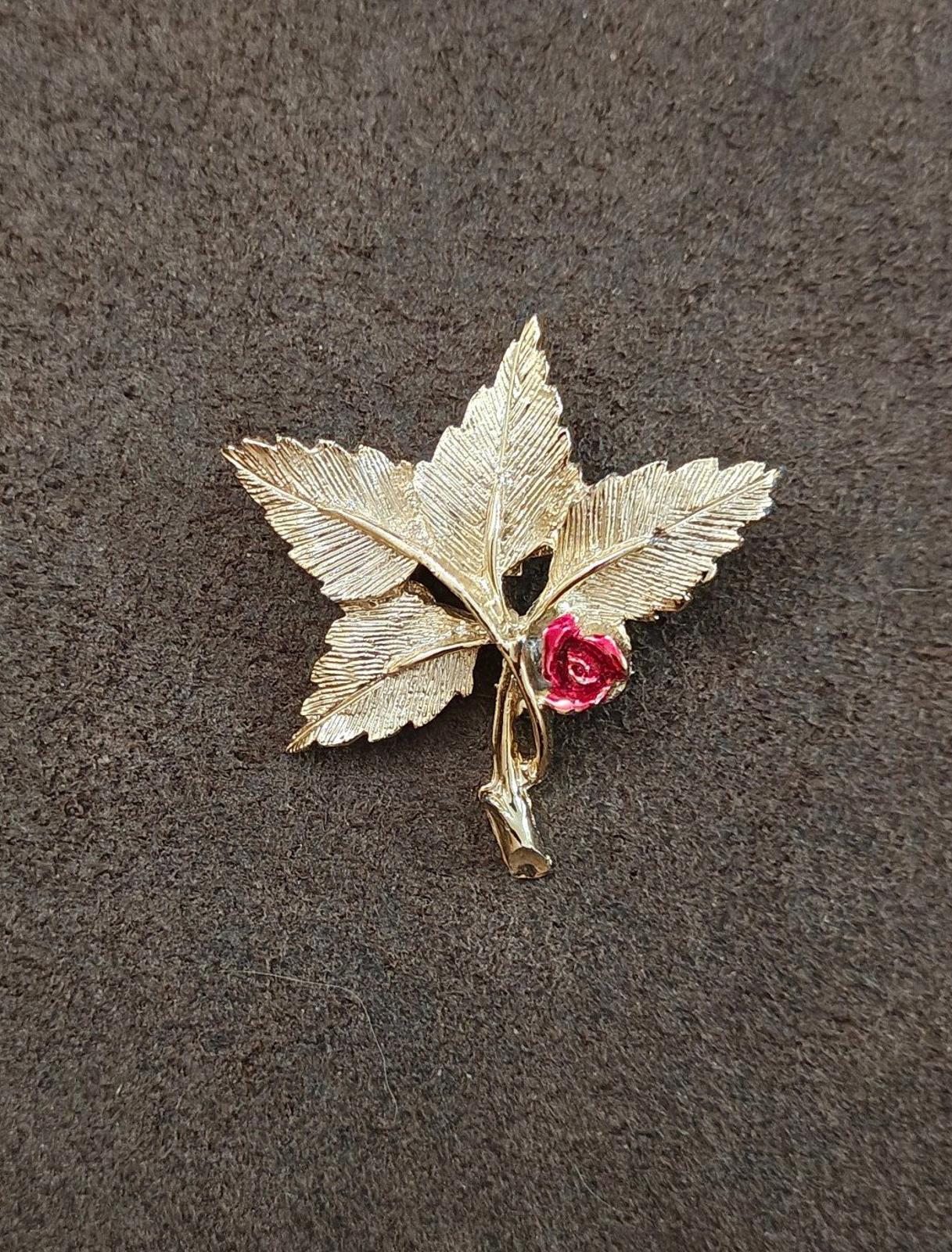 Gold-tone leaf cross pin brooch with red rose and Mary medallion, small view