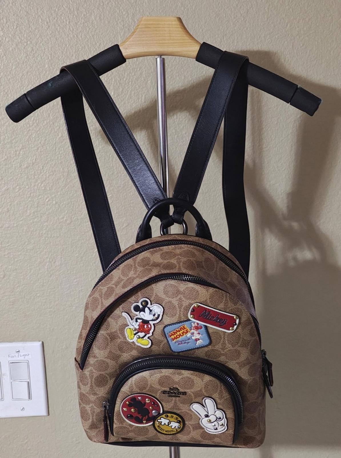 Disney X Coach Carrie Backpack 23 In Signature Canvas With Patches