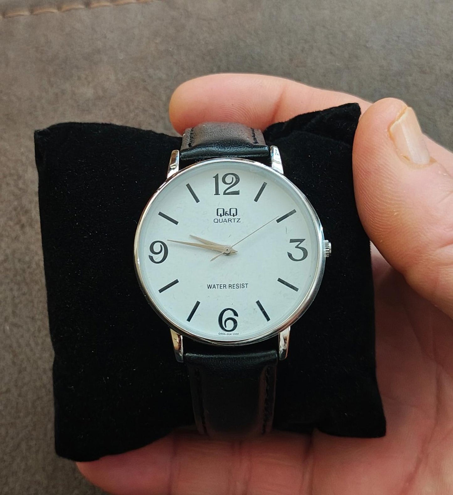 Q&Q Men's Analog Wrist Watch With White Dial and Black Leather Band.